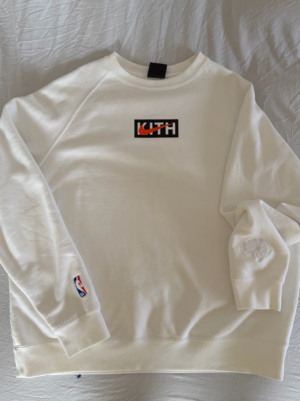 Kith x Nike Knicks White Crewneck with Orange Logo Accent